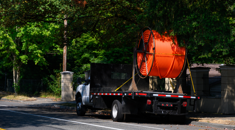 TxDOT Joint Duck Spotlight project location. Large vehicle with cable spool attached.