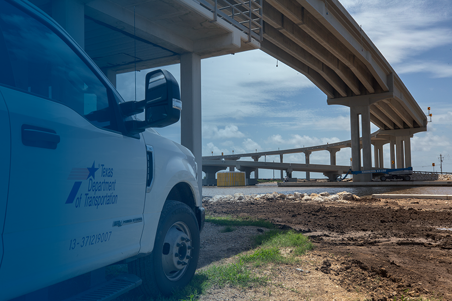 txdot truck with highway in background