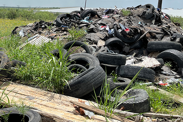 Tires and trash illegally dumped