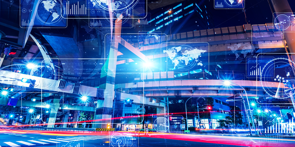 Vista nocturna de la ciudad con gráficos