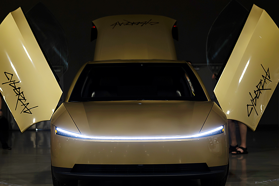 A cybercab with doors open at the Texas Innovation Invitational on June 15-17, 2026, in Allen, Texas. 