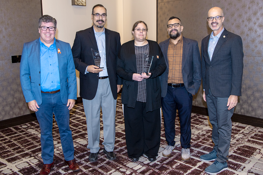 TxDOT Innovators of the Year at the 2023 Short Course in College Station (l-r): Graham Bettis; Edgar Cuellar; Taya Retterer; Robert Owens; Marc Williams, TxDOT Executive Director. Edgar Cuellar and Taya Retterer of the Bridge Division won the 2023 Innovator of the Year award for outstanding initiative and creative implementation of 3D bridge models. Their innovation helps accelerate project delivery and greatly improves the bridge design process at TxDOT.