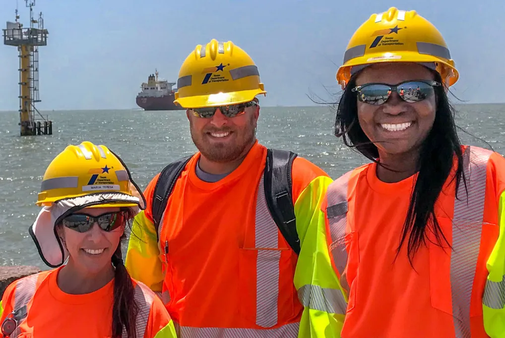 TxDOT employees wearing PPE on the coast