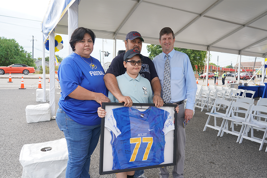 The family of Sergio Ivan Rodriguez attend the groundbreaking of the memorial pedestrian bridge being built in their son's memory. 