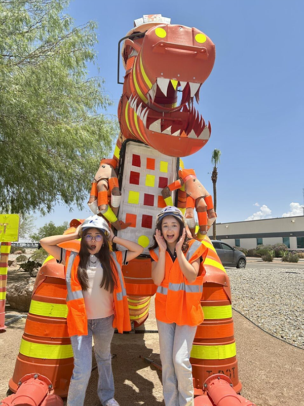 TxDOT T-Rex barrel monster in El Paso.
