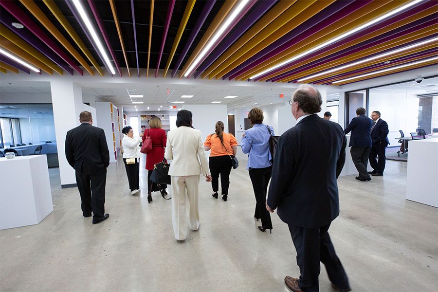 People on tour of building