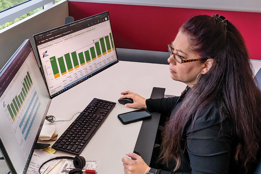 txdot employee at desk with charts on screen