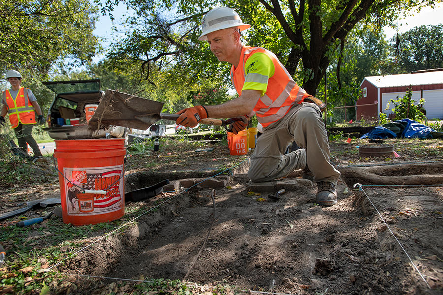 Archaeologist at dig site