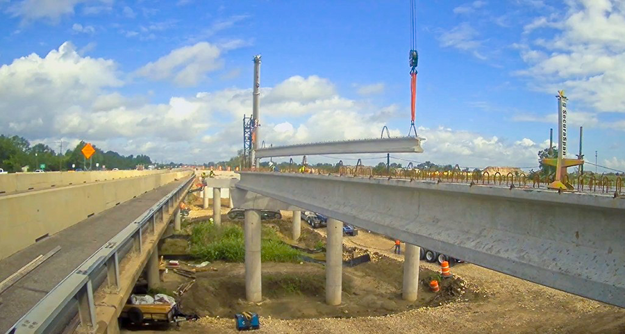 Crews make progress on bridge beam installation on westbound SH 71 at Dry Creek