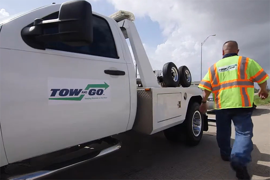 Tow and Go Program tow truck and driver Tow and Go Program tow truck and driver