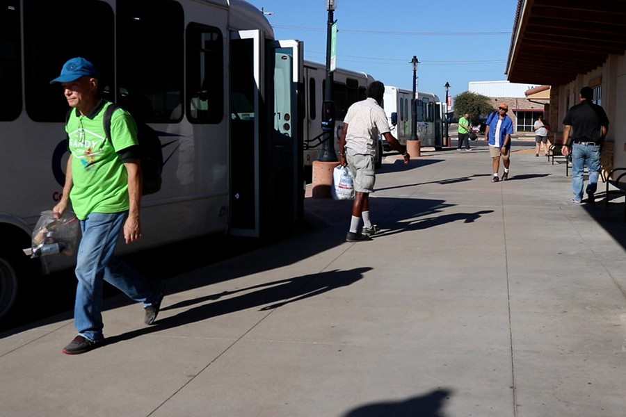 Passengers departing transit buses